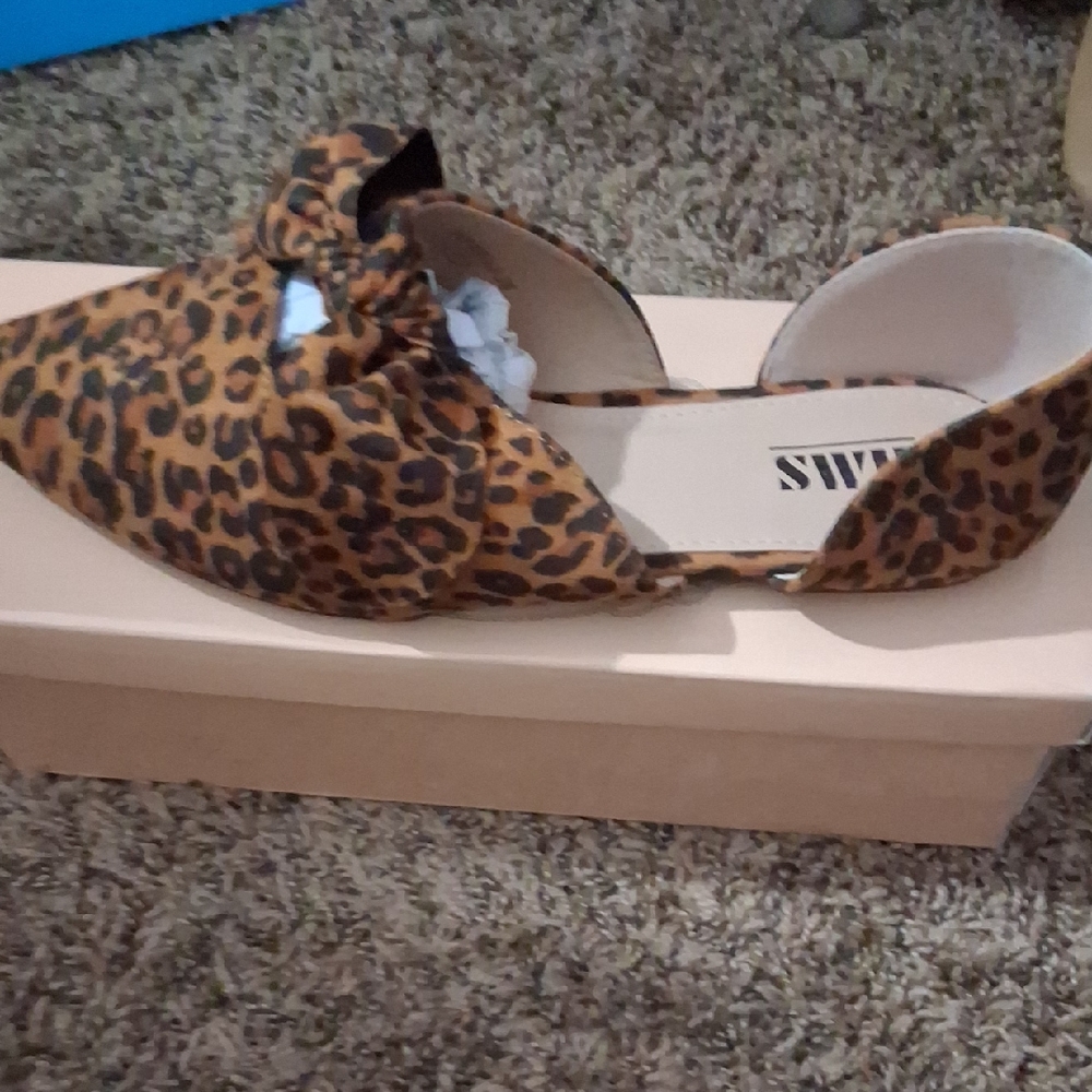Brown Leopard Print Flats with Classic Clog Design